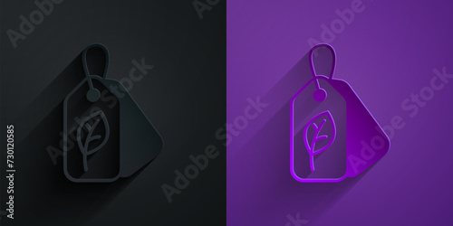 Paper cut Tag with leaf symbol icon isolated on black on purple background. Banner, label, tag, logo, sticker for eco green. Paper art style. Vector