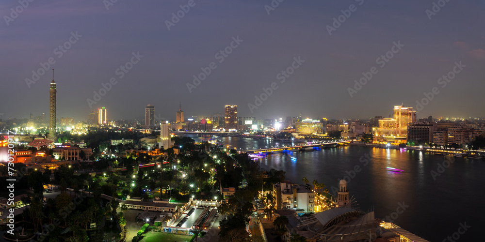 Aerial view of Cairo tower and the Nile river at night in Cairo, Egypt