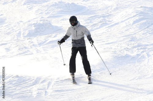 One Skier enjoying a day on the slope skiing © coachwood