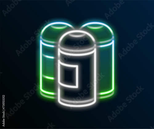 Glowing neon line Paint spray can icon isolated on black background. Colorful outline concept. Vector
