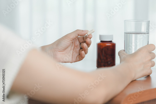 Hand holding a glasses of d...