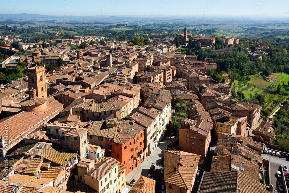 Naklejka premium Aerial view of the terracotta rooftops of the UNESCO world heritage city of Siena