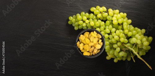 Heap of Yellow Sultanas Raisins on White Background photo