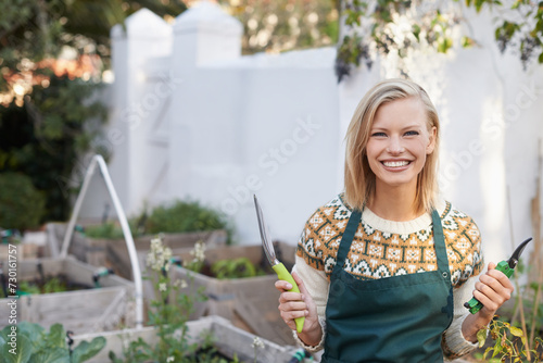 Gardening, happy and portrait of woman with tools for landscaping, planting flowers and growth. Agriculture, nature and person outdoors with equipment for environment, ecology and nursery in garden