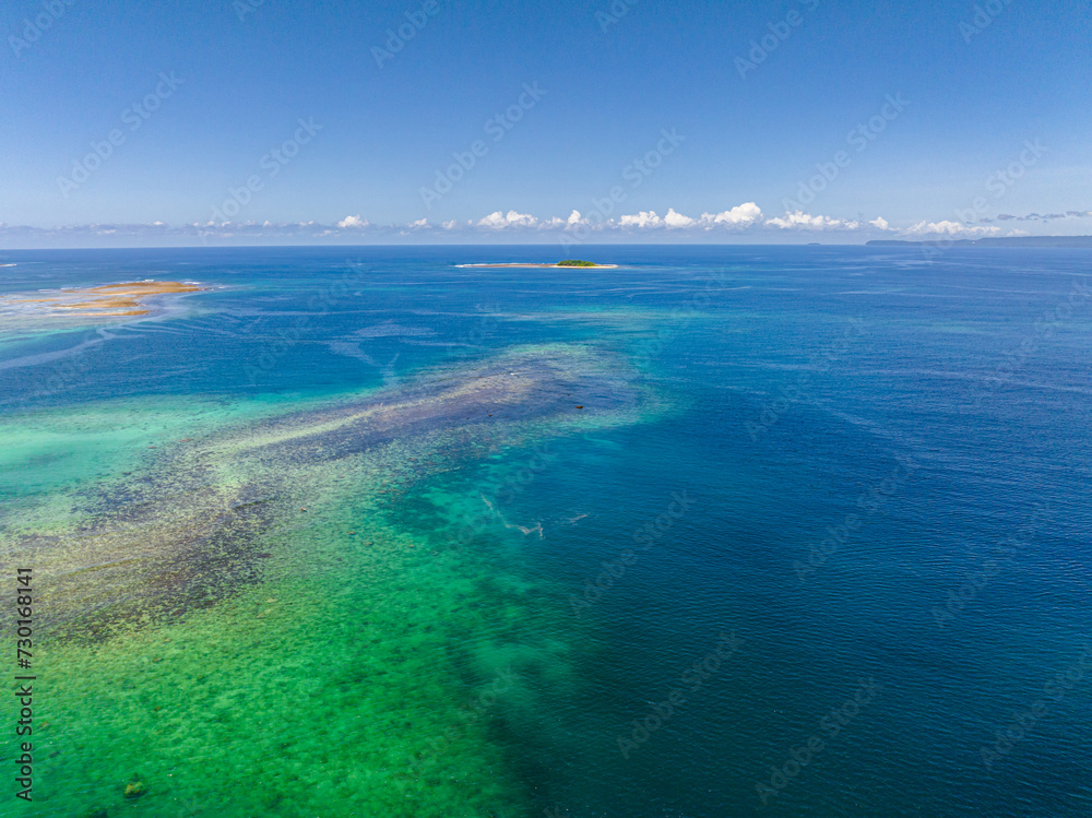 Great Barrier Reef and Jobo Island. Britania Island. Mindanao, Philippines. Travel and summer concept.