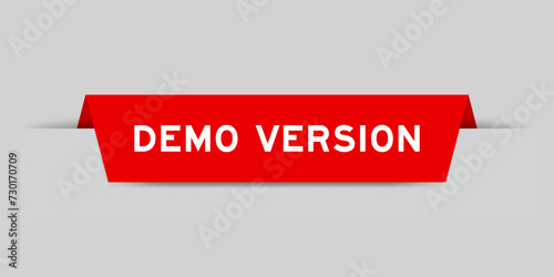 Red color inserted label with word demo version on gray background