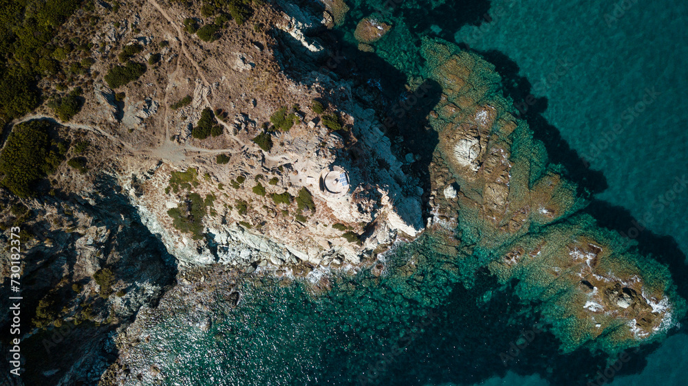 Drone photography genoise tower, cala and barcaggio beach with turquoise waters in Cap Corse 