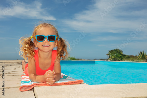 Smiling girl relaxing near pool day with sunglasses have fun