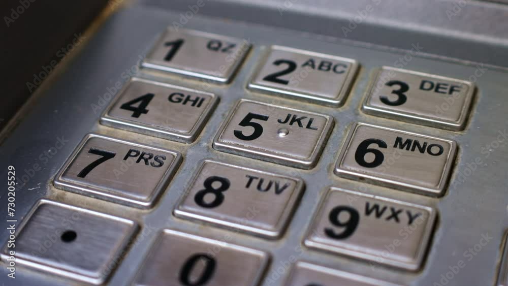 Keypad of ATM banking machine for pin code entering for cash withdrawal close up Keypad of ATM banking machine for pin code entering for cash withdrawal close up
