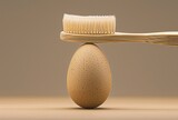 Eco-friendly oral care: Bamboo toothbrush balanced on natural stone is a symbol of sustainable living and environmental awareness