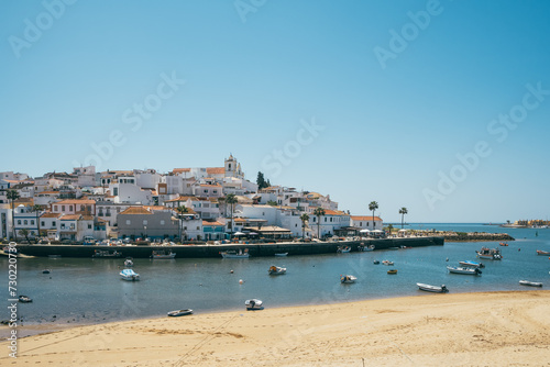 Old village of Ferragudo and Portimao town at background in Algarve region, South Portugal