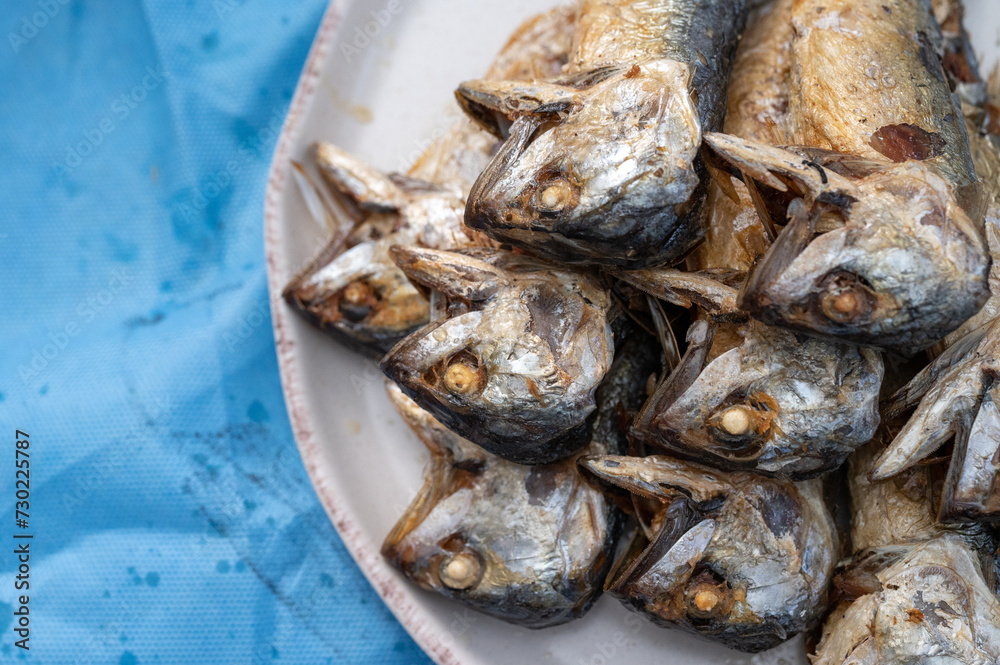 Pan Fried Mackerel fish serving on a plate. Mackerel fish being oily