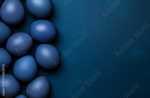 blue easter egg and bow on a blue background