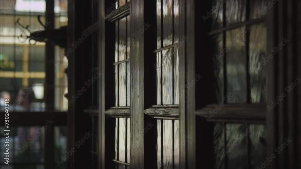 Reflections in the windows of a building foyer Reflections in the windows of a building foyer