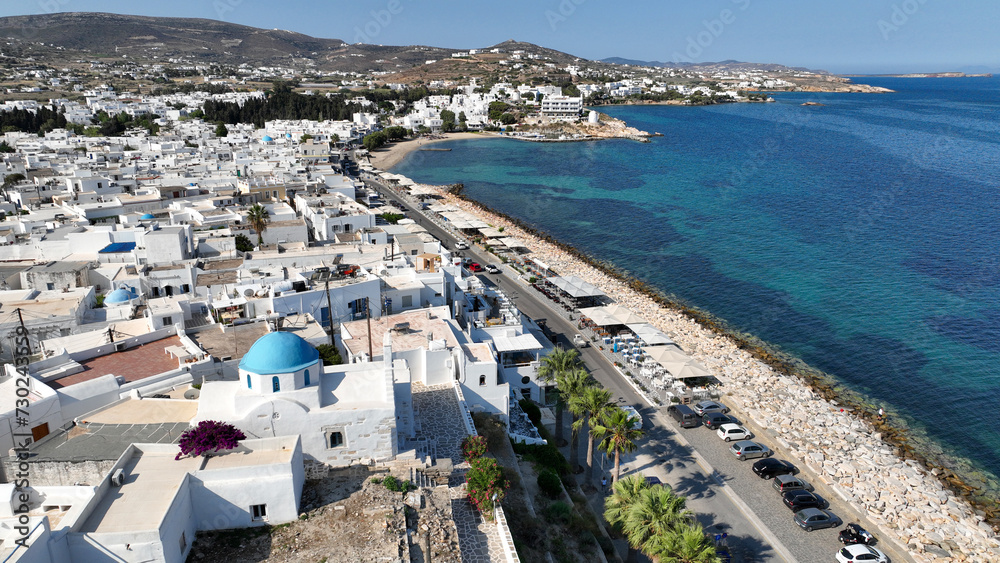 Aerial drone photo of traditional whitewashed picturesque main village of Paroikia or hora with unique Cycladic architecture, Paros island, Cyclades, Greece