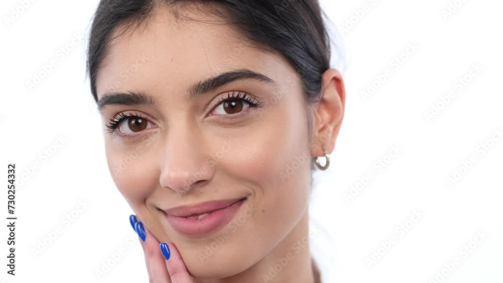 Portrait of a Caucasian woman smiling against a white background. Emotions of satisfaction, positivity, and friendliness. Woman is individual and beautiful. Portrait of a Caucasian woman smiling against a white background. Emotions of satisfaction, positivity, and friendliness. Woman is individual and beautiful.