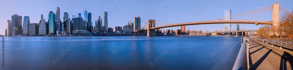 New York City Skyline, Panoramic landscape of Manhattan skyscrapers and Brooklyn Bridge over the East River, the view from Brooklyn Bridge Park, USA