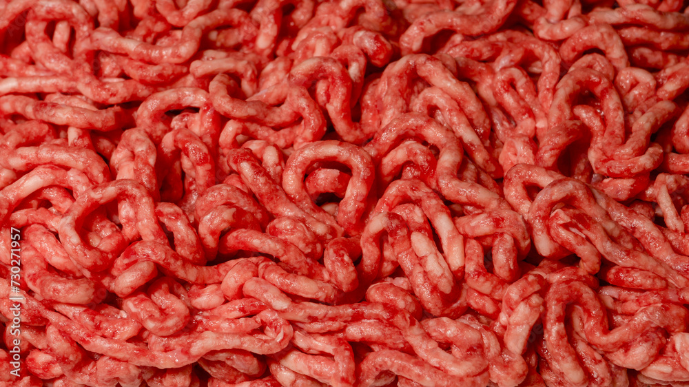 Raw minced beef close-up, top view. Raw minced beef close-up, top view.