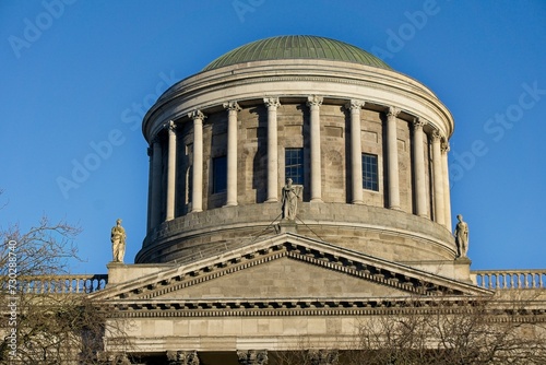 Four Courts seen across Liffey river in Inns Quay, Dublin, Ireland
