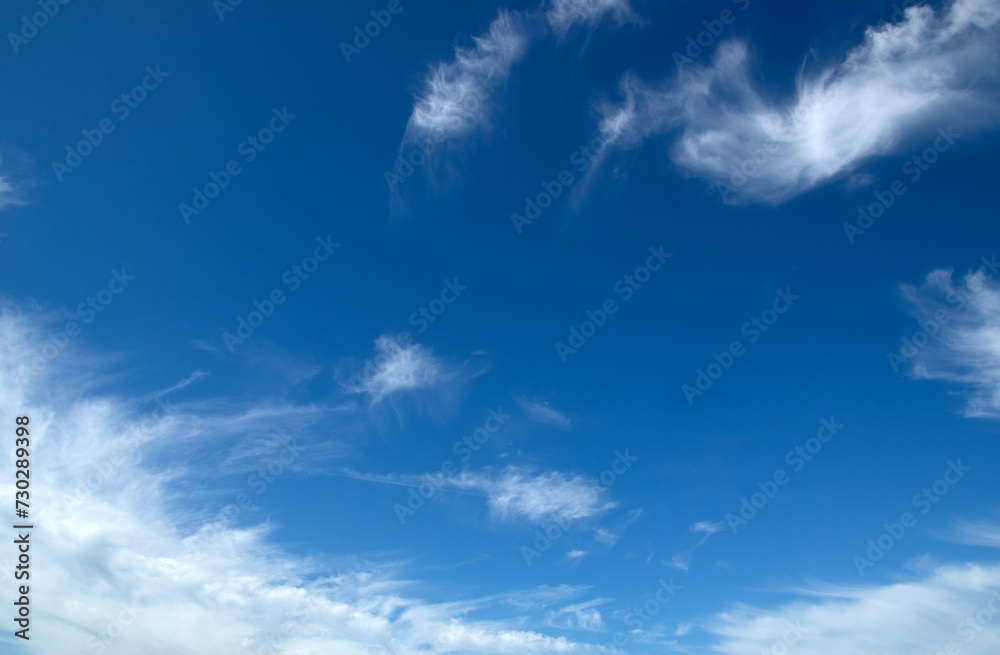 White fluffy clouds in the blue sky. White fluffy clouds in the blue sky.