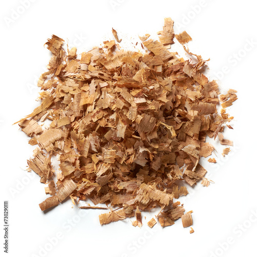 wood chips or shavings, small pieces of wood produced as a byproduct, shaved or chopped from larger pieces of wood, renewable and environmentally friendly resources, isolated on white background