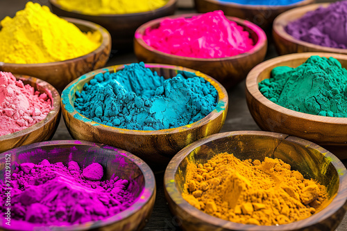 High angle view of colorful powder paints in bowls on table, Morocco, Colorful Indian powder paints, High angle view of multi colored powder paints on table