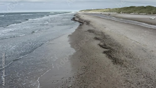 Drone flight on the Danish North Sea beach with Rudbjerg Fyr in the background