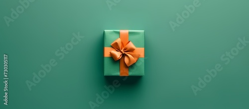 a pink bow on a gift box photo