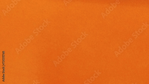 Orange Grunge Texture on Paper Background with Light Yellow Accents