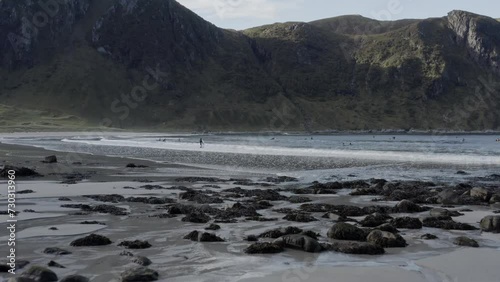 Drone flight on the coast of western Norway with surfers
