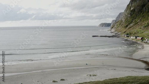 Drone flight on the coast of western Norway with surfers