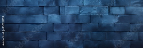 Indigo wall with shadows on it, top view, flat lay background texture