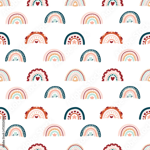 Cute bohemian baby seamless pattern with rainbows, clouds, stars. Vector pattern in boho style
