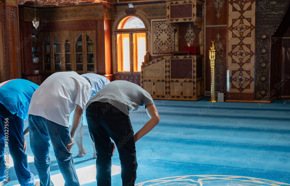 adults praying inside masjid and Kneeling in pray Stock Photo | Adobe Stock