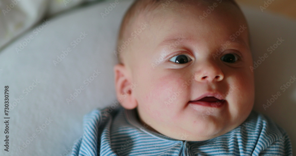 Happy baby portrait face looking to camera smiling and laughing Happy baby portrait face looking to camera smiling and laughing
