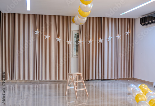 Celebration decorations indoor with baloons and stars to have wonderfull time photo