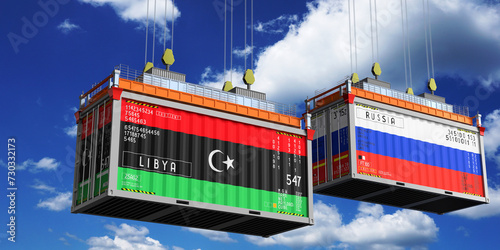 Fototapeta Naklejka Na Ścianę i Meble -  Shipping containers with flags of Libya and Russia - 3D illustration