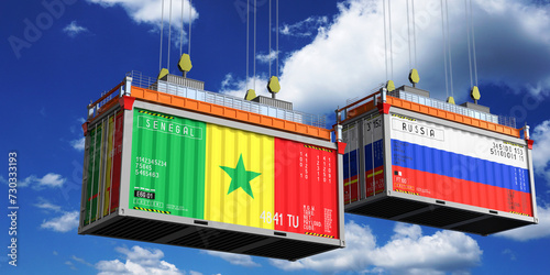 Fototapeta Naklejka Na Ścianę i Meble -  Shipping containers with flags of Senegal and Russia - 3D illustration