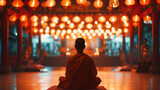 Monk meditating under hanging lanterns: Vesak, Wesak Buddha Day Celebration 