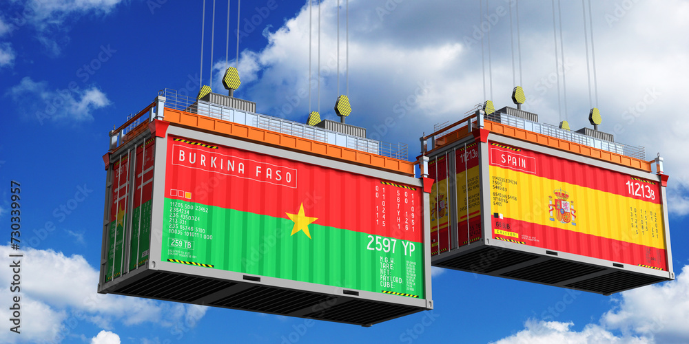 Shipping containers with flags of Burkina Faso and Spain - 3D illustration