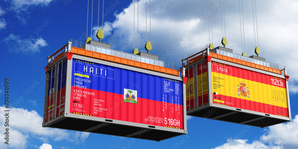Shipping containers with flags of Haiti and Spain - 3D illustration