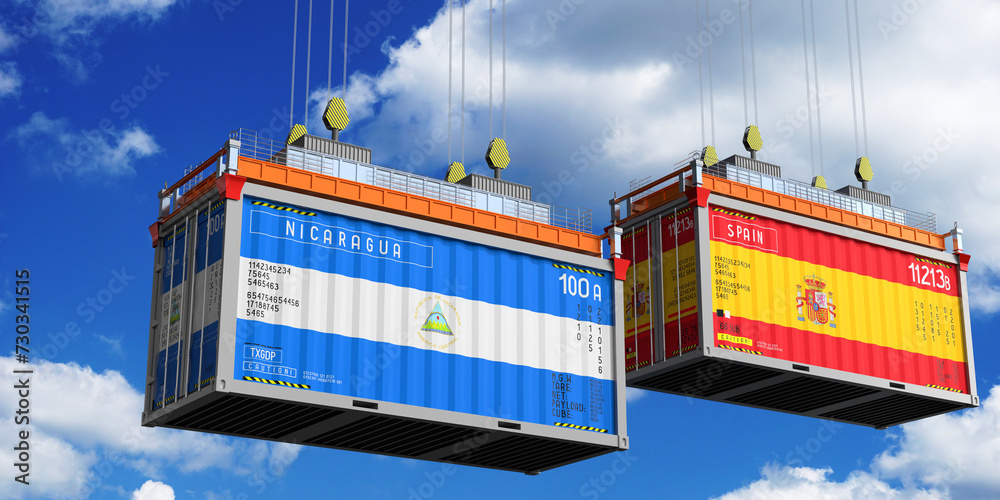 Shipping containers with flags of Nicaragua and Spain - 3D illustration Shipping containers with flags of Nicaragua and Spain - 3D illustration