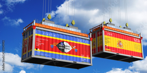 Shipping containers with flags of Eswatini and Spain - 3D illustration