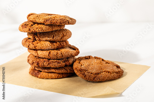 Stacked cookies on white plaster background

 photo