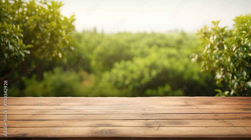 Wooden table with garden blurred bokeh background Wooden table with garden blurred bokeh background