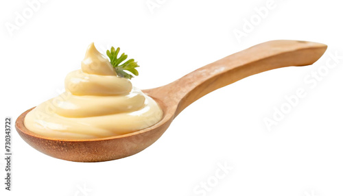 Mayonnaise in a wooden spoon. Isolated on transparent background.