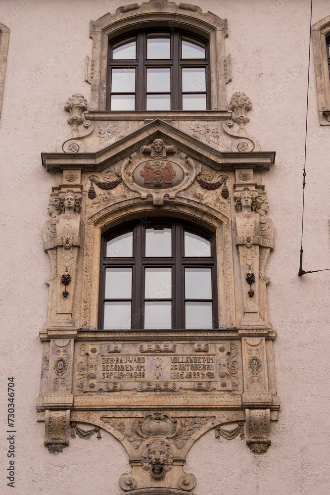 Munich, Germany -April 27,2023: Details of stone ornaments on the facades of baroque buildings in the German city Munich.