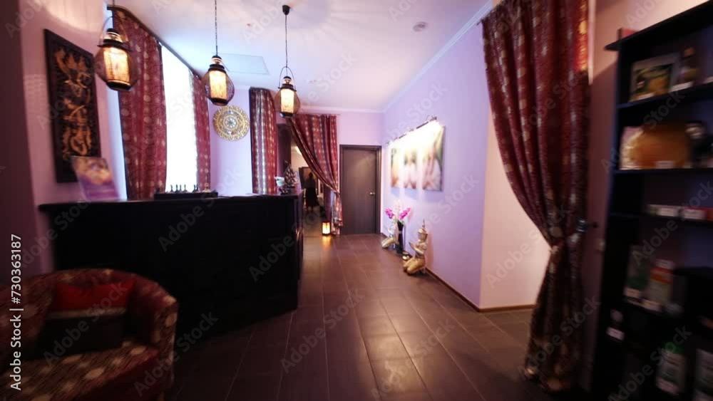 Wooden reception with carving in thai day spa with asian decoration Wooden reception with carving in thai day spa with asian decoration