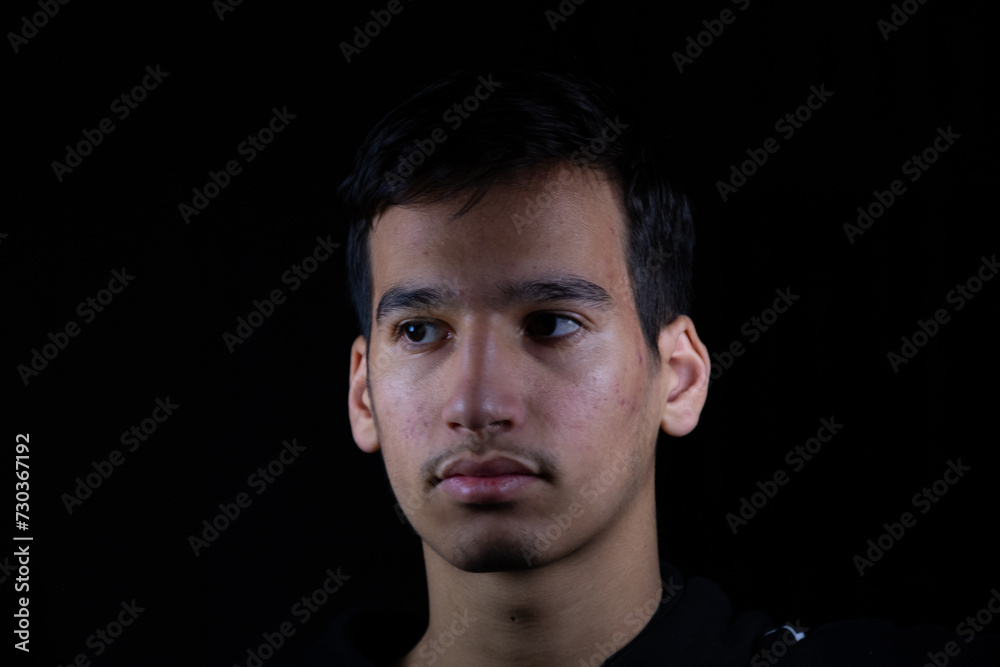 Portrait for teenager in dark and light studio Portrait for teenager in dark and light studio