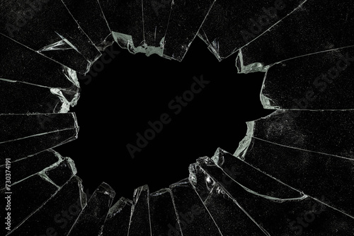 Cracked Pieces Broken Glass Hole on Black Background